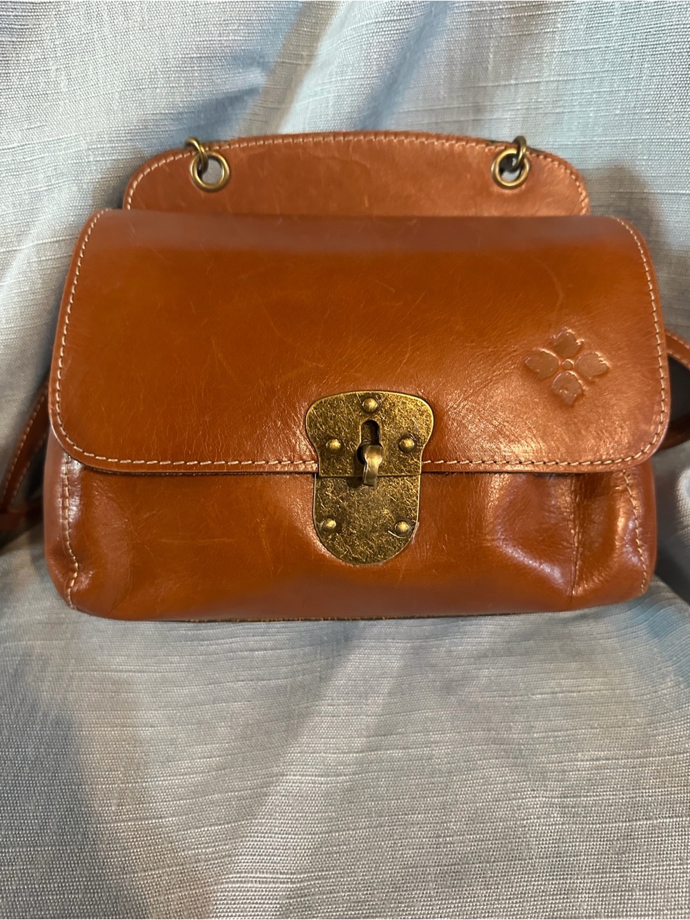 Patricia Nash Saddle Brown Leather Crossbody with Antiqued Brass Lock